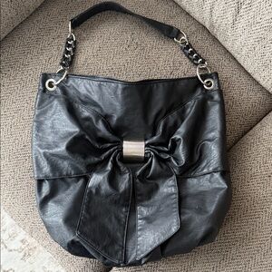 Bueno black slouchy hobo bag with a chic bow detail and chain-accent